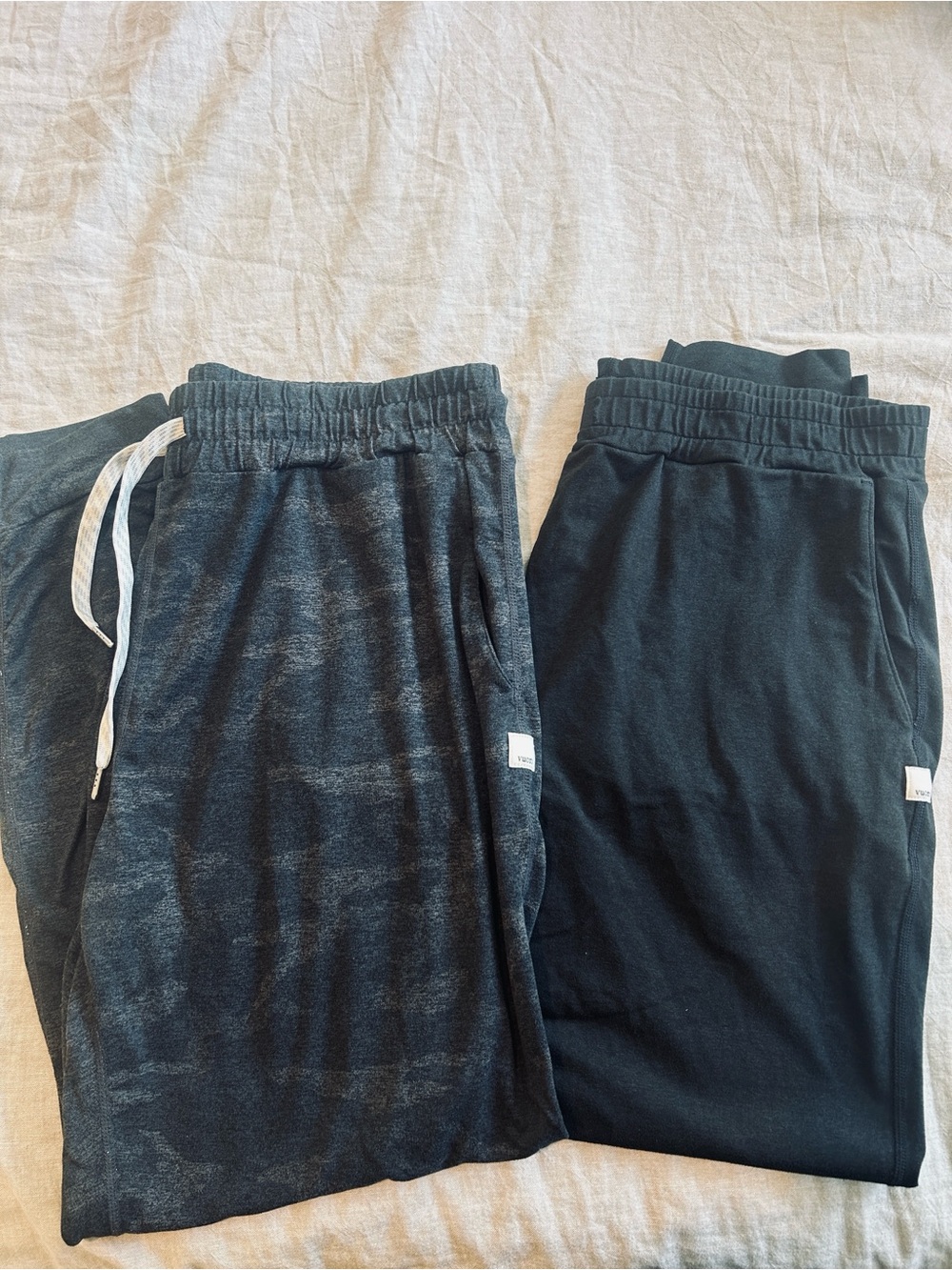 Pair of Vuori joggers Black and Camo Track Joggers - Drawstring Waist